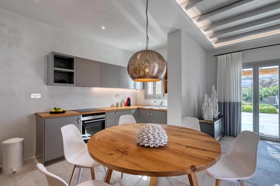 14-M-THREE-Villa-dining-area-and-kitchen-with-garden-view